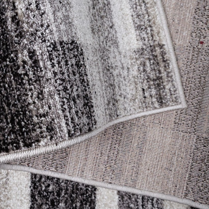 Модерен сиво-кафяв килим с правоъгълници