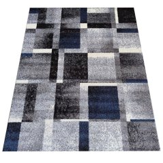 Koberec s geometrickými vzory v modro-šedé barevné kombinaci 