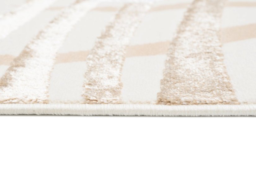 Dizajnový koberec s exotickými listami v béžovej farbe Golden