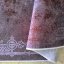 Tappeto scuro con cornice e patina orientale pregiata