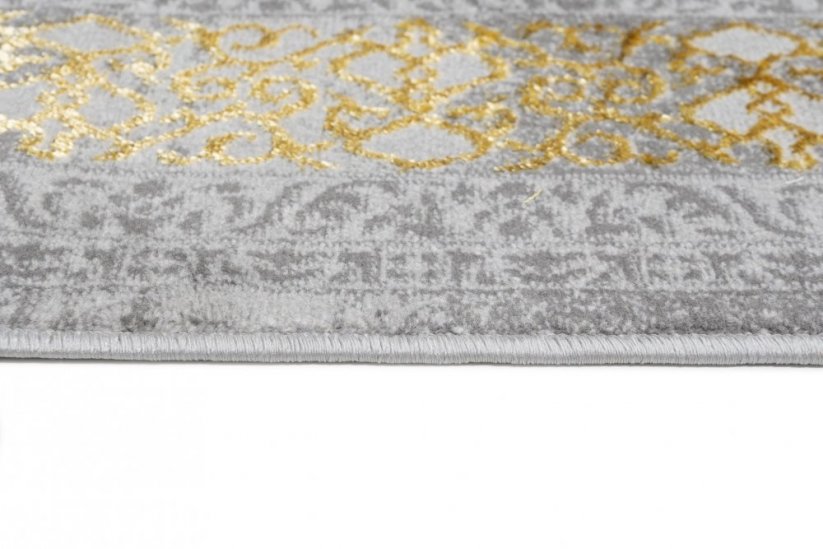 Ekskluzivni sivi tepih sa zlatnim orijentalnim uzorkom