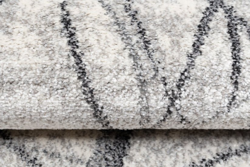 Moderni tepih svijetlo krem boje s motivom lišća