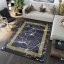 Covor trend negru cu model geometric auriu