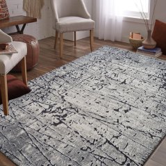 Moderner abstrakter grauer Teppich
