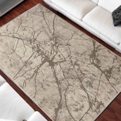 Bézs színű szőnyeg absztrakt mintával