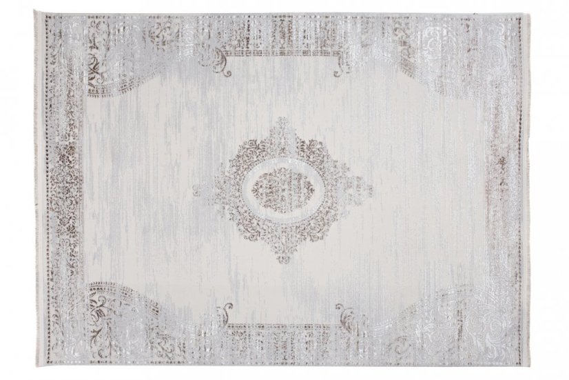 Dizajnový vintage koberec so vzorom v krémovej farbe