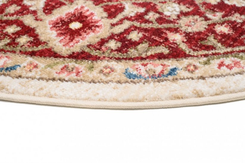 Okrúhly vintage koberec krémovej farby