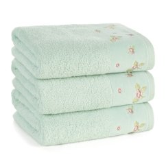 Bombažna brisača v zeleni barvi z velurnim robom in cvetlično vezenino