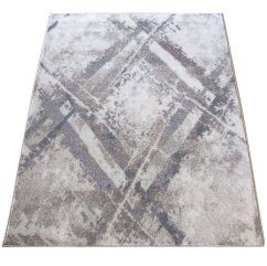 Bézs színű szőnyeg modern absztrakt mintával