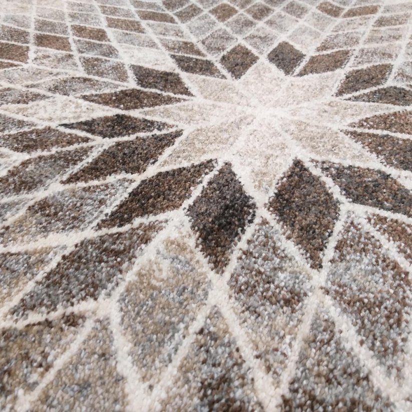 Einzigartiger beiger Teppich mit abstraktem Muster