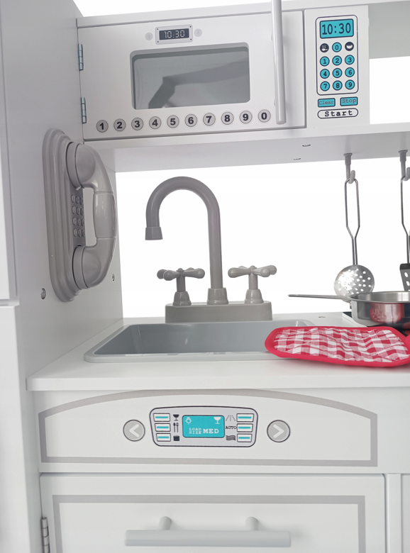 Fehér gyermekkonyha kiegészítőkkel és LED világítással