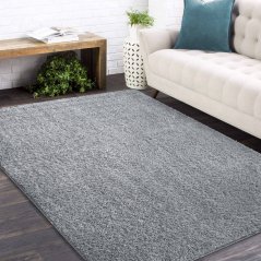 Jednofarebný shaggy koberec sivej farby