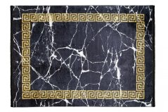 Schwarzer Trendteppich mit geometrischem Muster in Gold