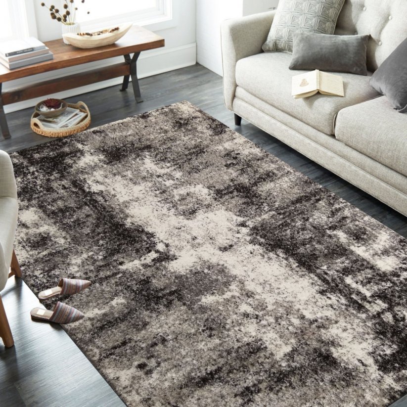 Moderní vzorovaný koberec béžové barvy do obývacího pokoje