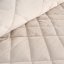 Elegantní sametový přehoz s geometrickým prošíváním - krémový