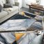 Exkluzívny vzorovaný koberec sivej farby