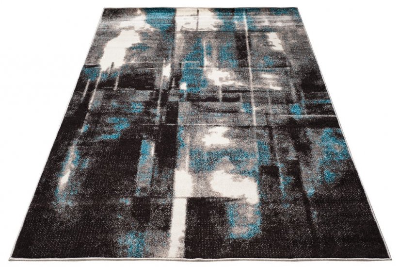 Moderný koberec s batikovaným vzorom