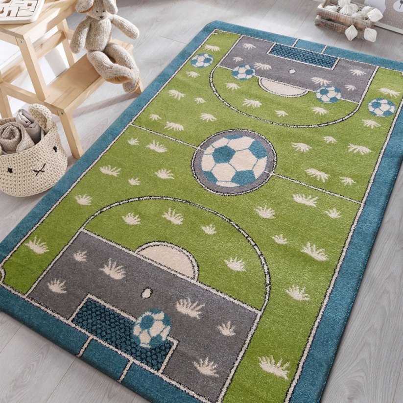 Zelený koberec s motívom futbalové ihrisko