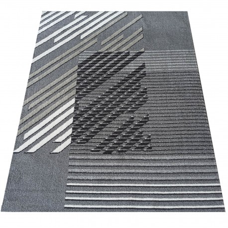Tappeto di design in grigio con strisce