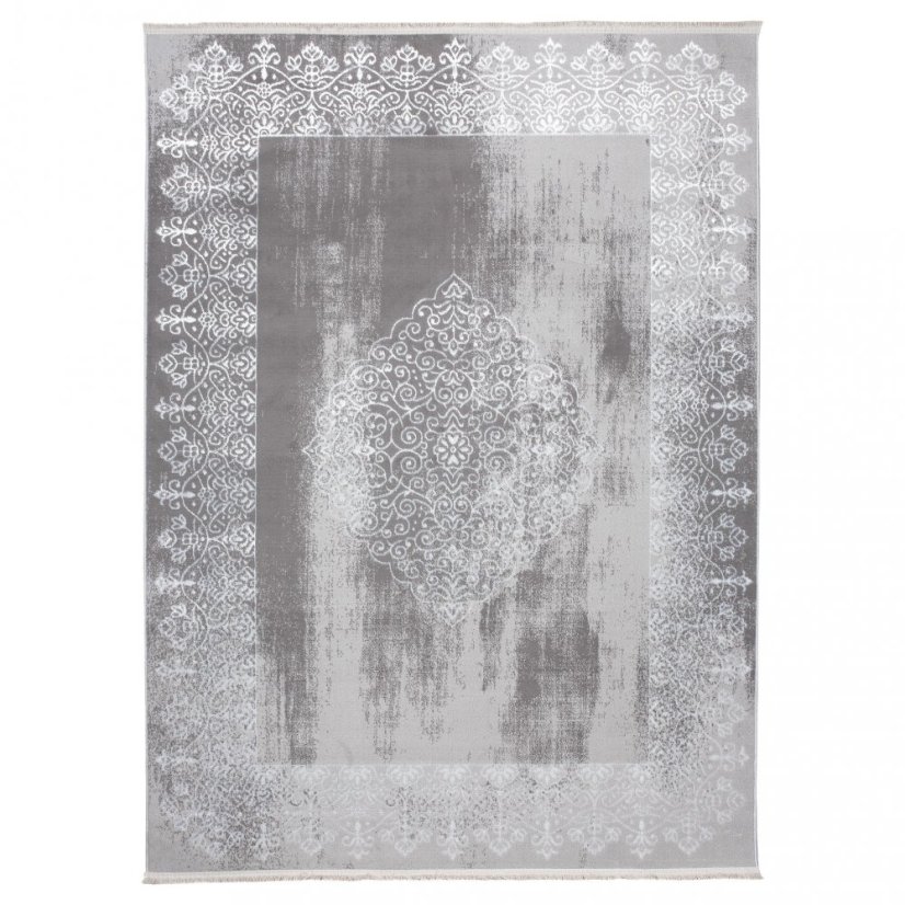 Moderný koberec sivej farby s orientálnym vzorom bielej farby