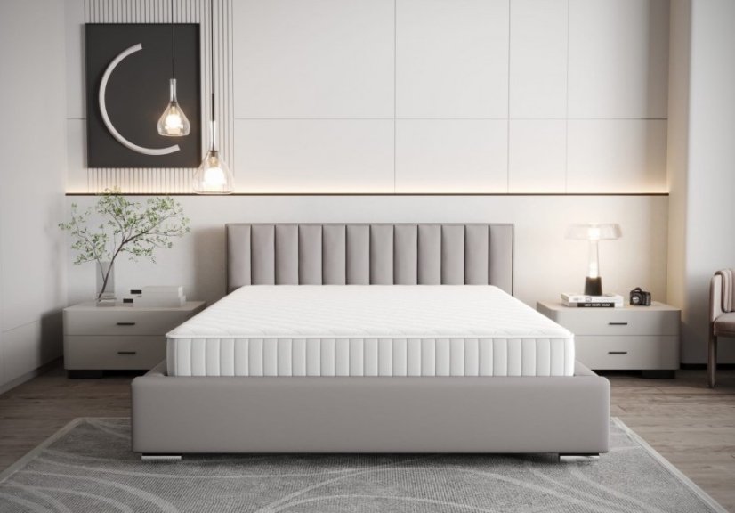 Moderní čalouněná postel s vertikálním prošíváním na čele ve světle šedé barvě 180 x 200 cm Moderní čalouněná postel s vertikálním prošíváním na čele ve světle šedé barvě 180 x 200 cm