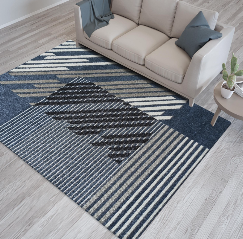 Tappeto di design in blu con strisce