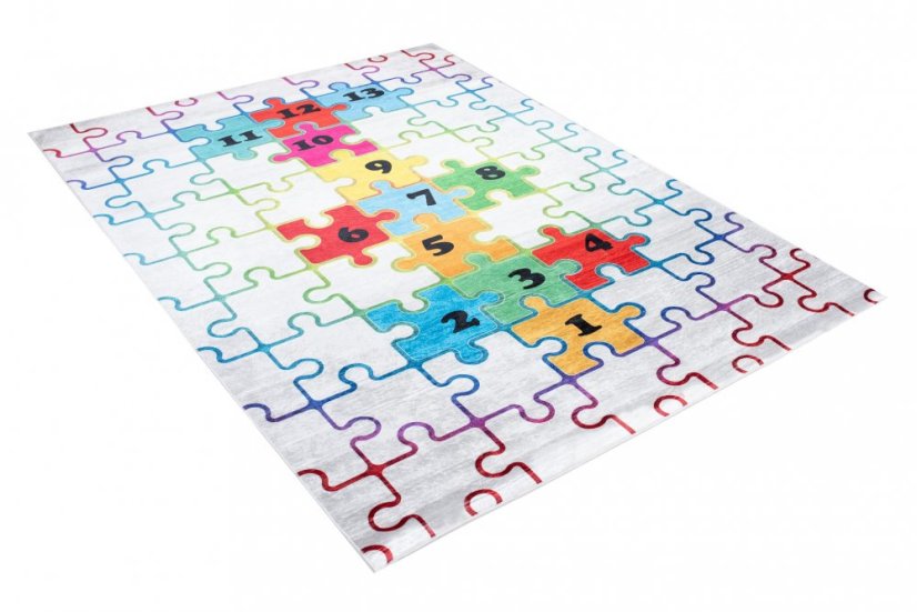 Kinderteppich mit buntem Puzzlemotiv