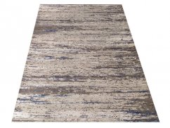 Moderní koberec v béžovo-hnědé barvě s modrým detailem