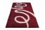 Červený shaggy koberec s krémovým vzorom